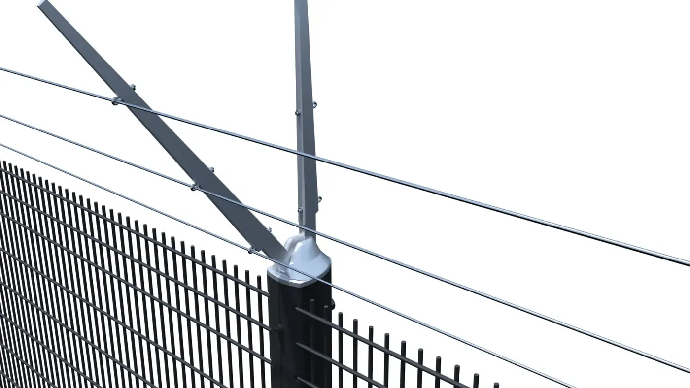 Close-up of a D-FENCE sensor bracket on a fence post, with taut wires above a welded-mesh panel