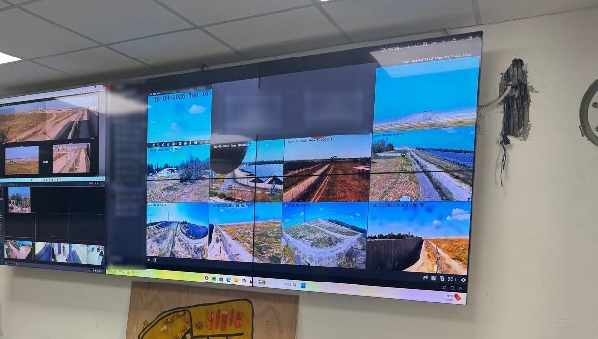 Control room video wall with live feeds from the perimeter cameras of a protected site