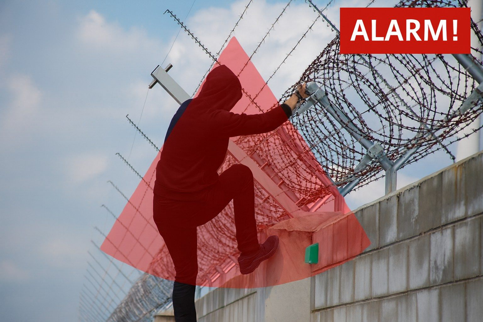 An intruder climbs a wall crown protected by concertina; the attacked zone is highlighted and an alarm is raised