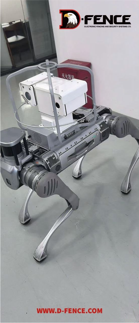 D-DOG indoors with a bi-spectrum PTZ camera (thermal + day) mounted in a protective roll cage on its back