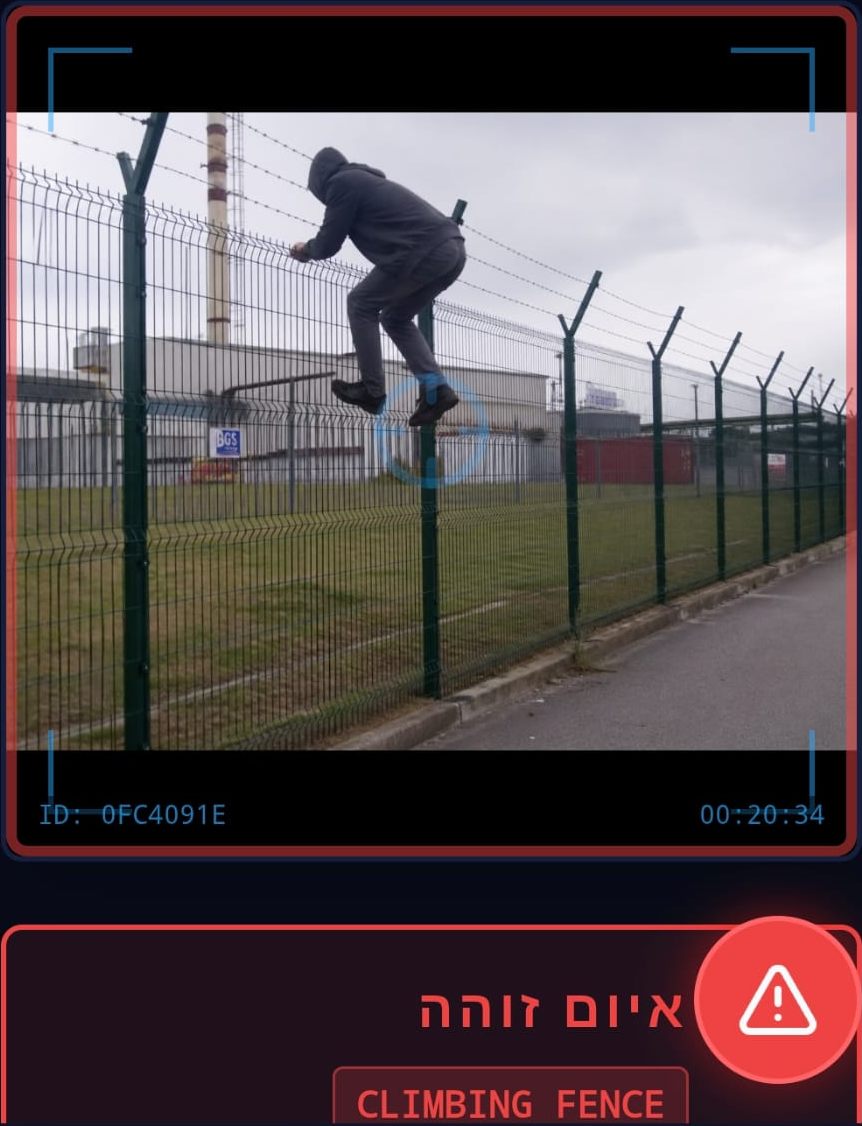 D-DOME Vision AI on a phone: an existing camera shows a person climbing a mesh fence and the app raises a 'Climbing fence' threat alert