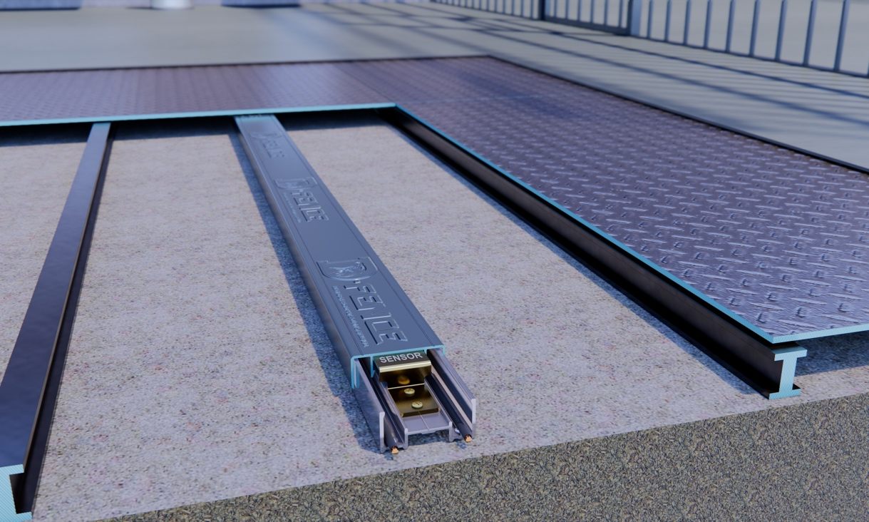 Close render of the ultra-slim D-Tech sensor channel, marked D-FENCE and SENSOR, set into the ground under chequer-plate floor panels